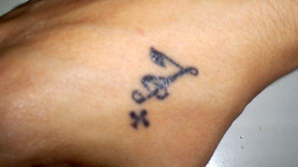 My tattoo: An amalgamation of a G-clef and a Seven of Clubs