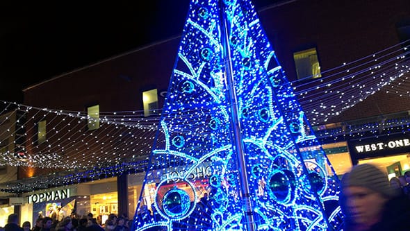 A gaudy bright blue Christmas tree on Fremlin Walk in Maidstone.