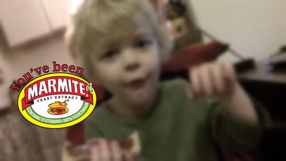 Lucien making a face of disgust as he tries Marmite for the first time.