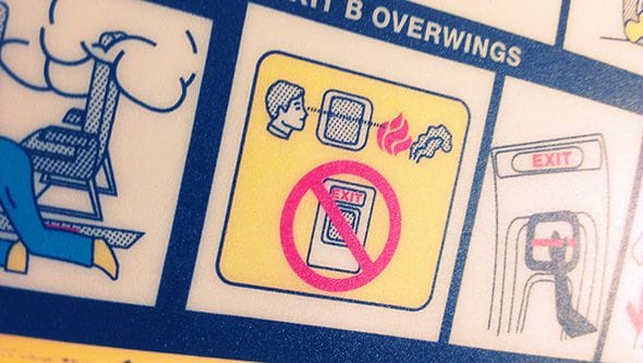 Close up of the safety instruction on our flight to Finland.