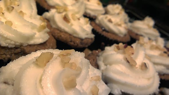 Closeup of the coconut frosting on the cupcakes.