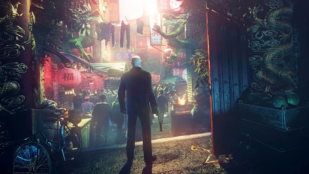 Agent 47 from the Hitman game series standing at the gates of a sprawling Chinatown.