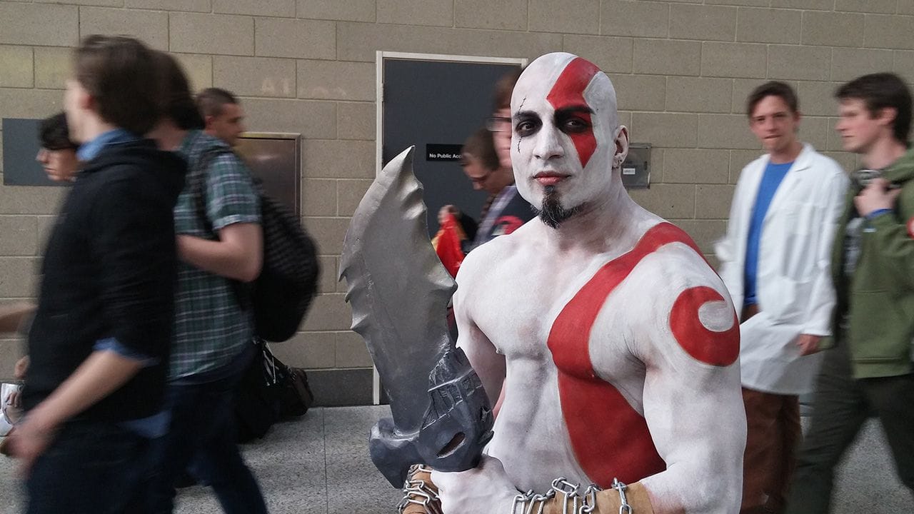 Man cosplaying as Kratos from the God of War game series.