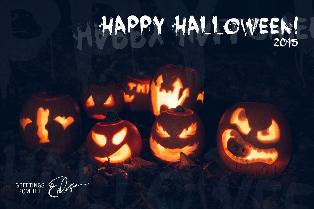 6 Jack O'Lanterns illuminated from the candles inside them and a Happy Halloween greeting from the Eriksson family.