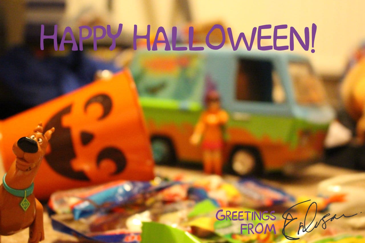 Carlos Eriksson Halloween greeting 2017 featuring Scooby-Doo and a pile of candy bags.