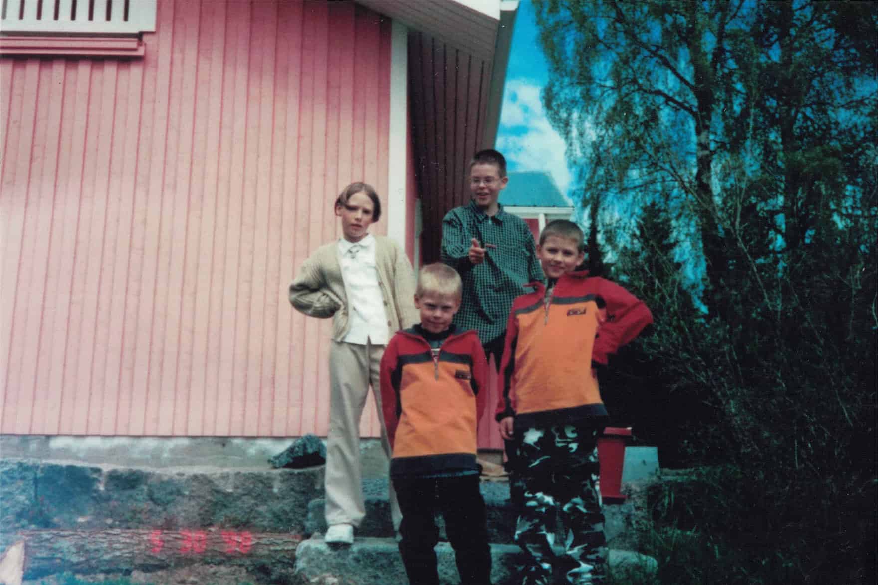 Carlos and siblings dressed as a Polish boyband, 1998.