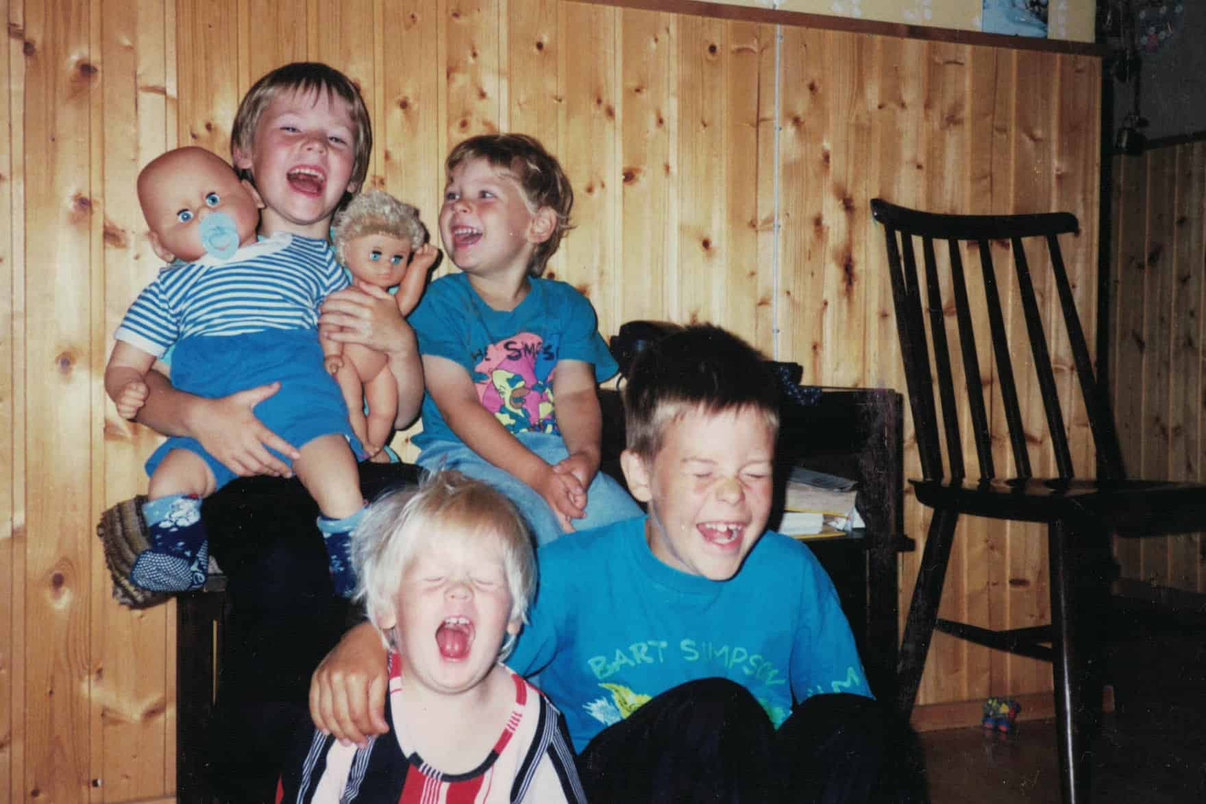 Carlos and siblings laughing hysterically, 1992.