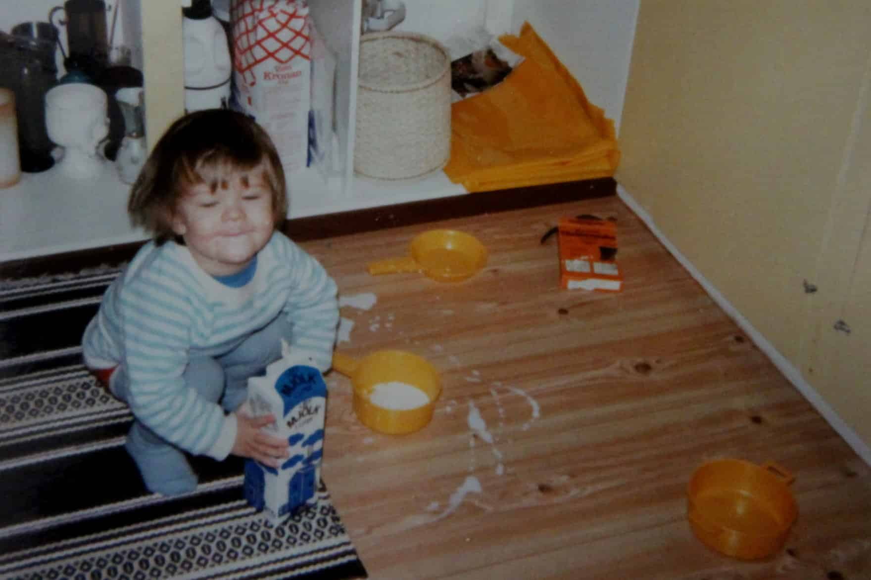 Carlos Eriksson as a toddler, making a mess in his mom's kitchen2.