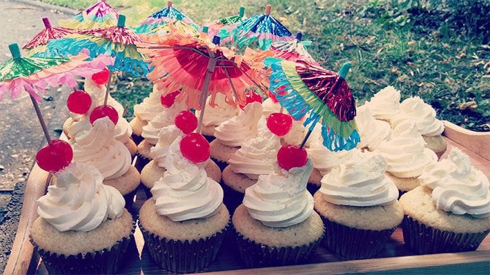 Piña Colada Cupcakes with Pineapple curd filling and Malibu Coconut Rum Flavoured Swiss Meringue Buttercream Frosting.