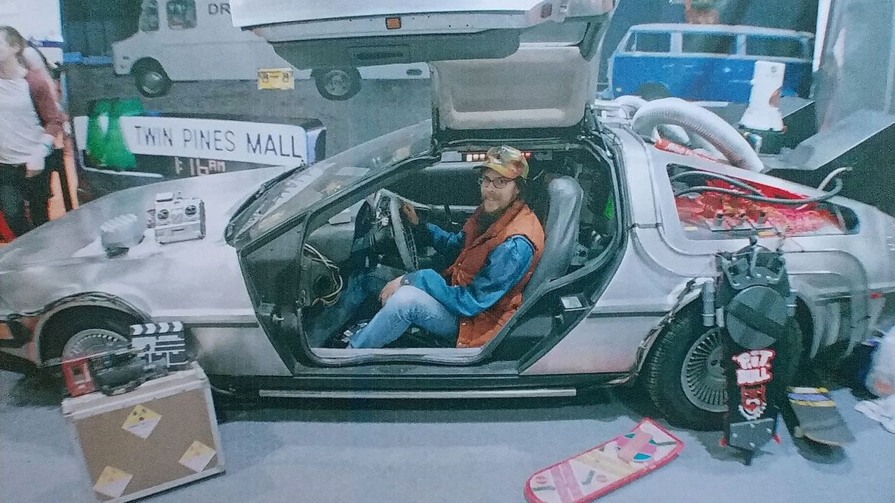 Carlos Eriksson sitting the DeLorean from the Back to the Future film series, starring Michael J. Fox and Christopher Lloyd.
