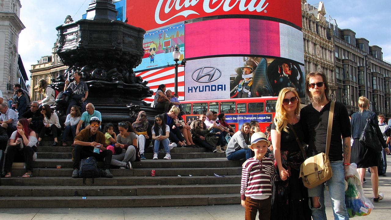 The Eriksson family standing at Piccadilly Circus.