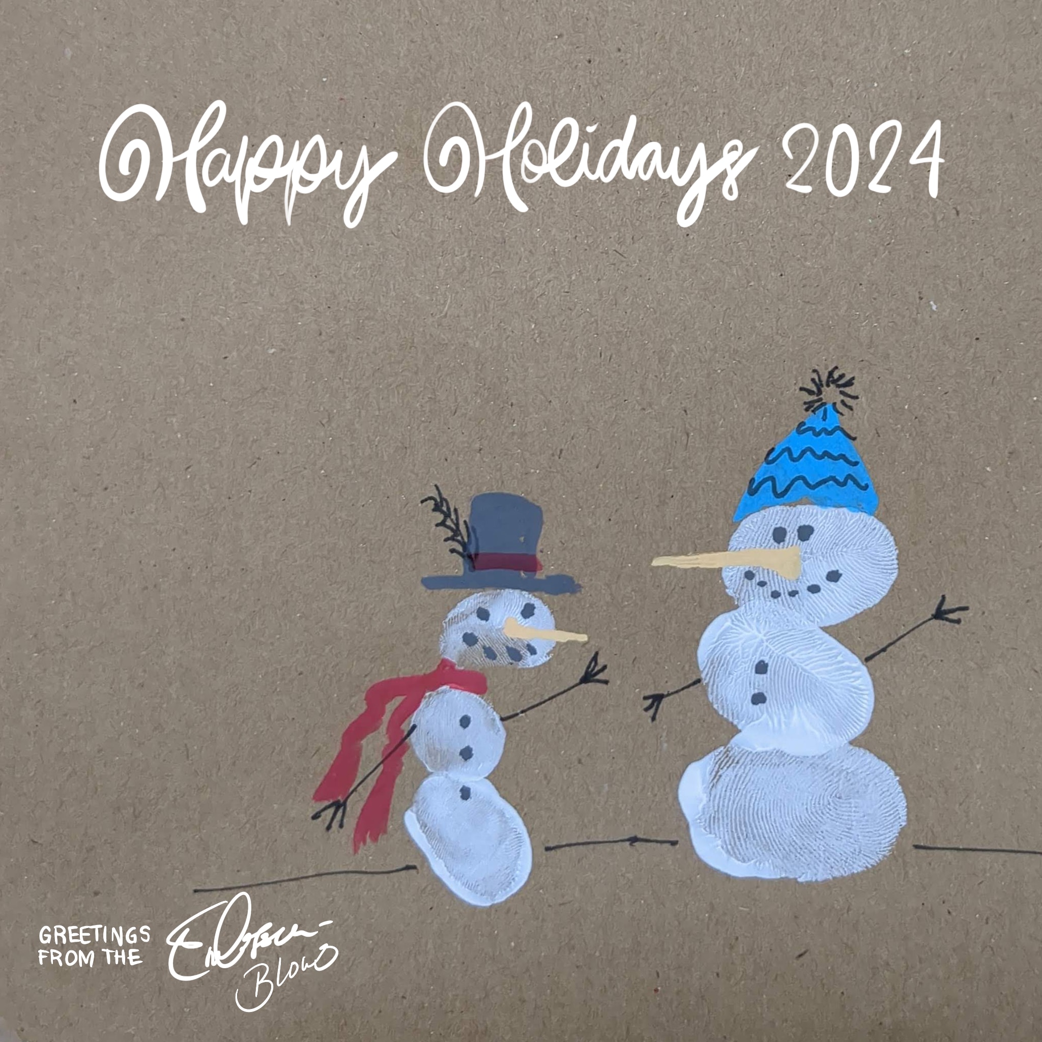 Two snowmen made from our white-coloured thumbprints. One showman is wearing a black tophat and red scarf and the other is wearing a blue beanie.